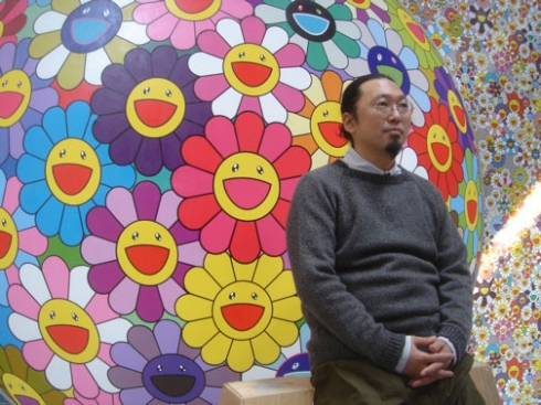 Murakami Standing Before His Flowers.jpg
